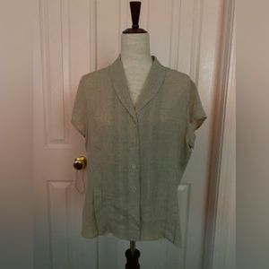 Silk beige and with black specks blouse.